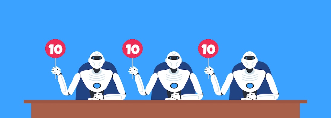 Jury bij een festival met drie robots die alledrie een bordje omhoog houfden met daarop 10